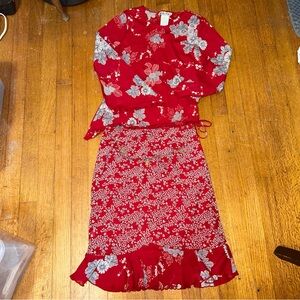 Red and white  floral top and skirt set. Youth XL (16)
Fits a small.